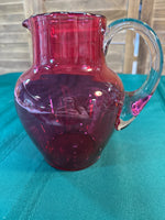 (A) Cranberry Glass Pitcher