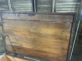 Antique Wooden Trunk with Metal Accents on Casters