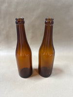 Pair Of Brown Glass Bottles