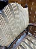 Antique Arm Chair with Carved Accents