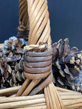 Woven Basket Full of Pinecones