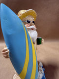 Santa Holding Surfboard
