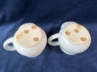 Pair Of Grandparents Ceramic Mugs With Tea Bag Holders