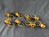 Set Of 8 Gold Tone Metal Floral Napkin Rings