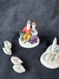 Department 56 “Seven Swans A Swimming” Figurine Set