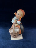 (A)Goebel Hummel Girl with Basket and Letter #13/0 "Meditation"