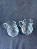 Lot Of 2 Small Clear Glass Water Pitchers