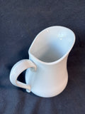 White Ceramic Pitcher