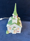 (B) Department 56  “Shops Of Dickens Village” New England Village Steeple Church, Light Works