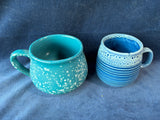 Pair Of Glazed Blue Pottery Mugs