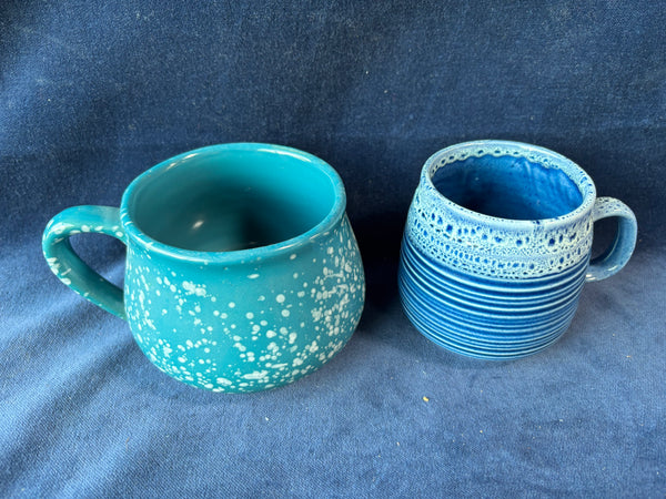 Pair Of Glazed Blue Pottery Mugs
