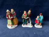 (R)Dept. 56 “ Christmas Carolers” 3 Piece Figurine Set