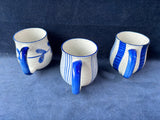 Set Of 3 Blue And White Speckled Glaze Pottery Mugs