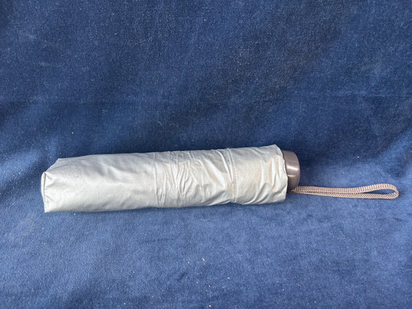 Estēe Lauder Silver Toned Umbrella