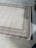 Tan and Brown Area Carpet