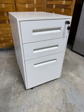 Small White Filing Cabinet with Key on Casters (B)
