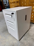 Small White Filing Cabinet with Key on Casters (B)