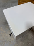 Small White Filing Cabinet with Key on Casters (B)