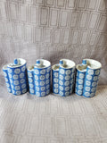 Set of 4 Blue and White Ceramic Vases
