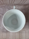 White Ceramic Dragonfly Teacup and Saucer Set