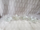 Set of 4 Clear Glass Star Candlestick Holders