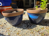 Two Large Plastic Planters w/Dirt (Blue Peel Paint on Outside)