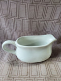 White Ceramic Gravy Boat and Saucer