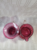 Pair of Miniature Cranberry Glass Pitchers