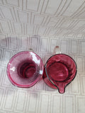 Pair of Miniature Cranberry Glass Pitchers