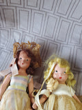 (B) Pair of Small Dolls