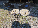 Two Black Metal Folding Chairs w/Yellow and Blue Mosaic Tile Seats