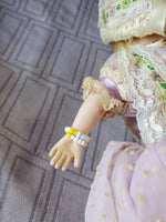 Vintage Doll in Purple Dress