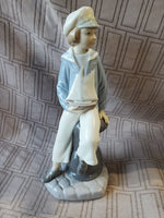 Lladro "Boy with Yacht" Figurine