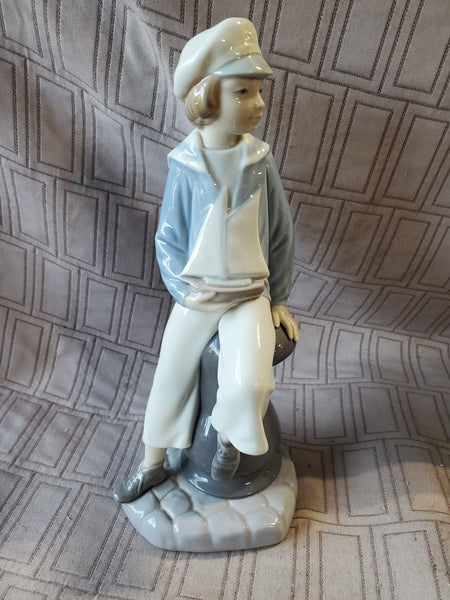 Lladro "Boy with Yacht" Figurine
