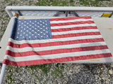 American Flag on Wooden Pole