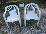 Two Plastic Outdoor Chairs
