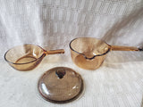 Pair of Corning Ware Visions Amber Glass Sauce Pans with One Lid