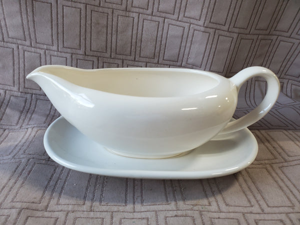White Stoneware Gravy Boat and Saucer