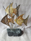 Metal Angel Fish Sculpture on Lava Rock