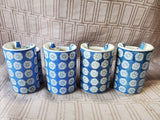 Set of 4 Blue and White Ceramic Vases