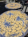 Two Black Metal Folding Chairs w/Yellow and Blue Mosaic Tile Seats