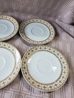 Set of 10 Fine Porcelain Saucers