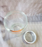 Clear Glass and Metal Kitchen Jar