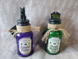 Pair of Hocus Pocus Sanderson Sisters Light Up Bottles WORKS