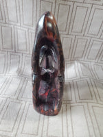 Carved Stone Sitting Person Sculpture