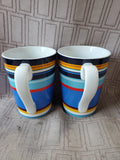 Pair of Lenox DKNY Mult-Colored Mugs (A)