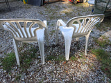 Two Plastic Outdoor Chairs