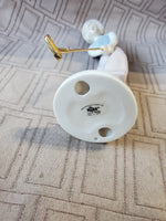 Russ Porcelain Golfing Lady Figurine