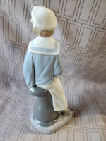 Lladro "Boy with Yacht" Figurine