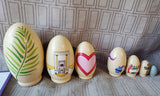 The Easter Story Egg Book and Wooden Nesting Egg Set